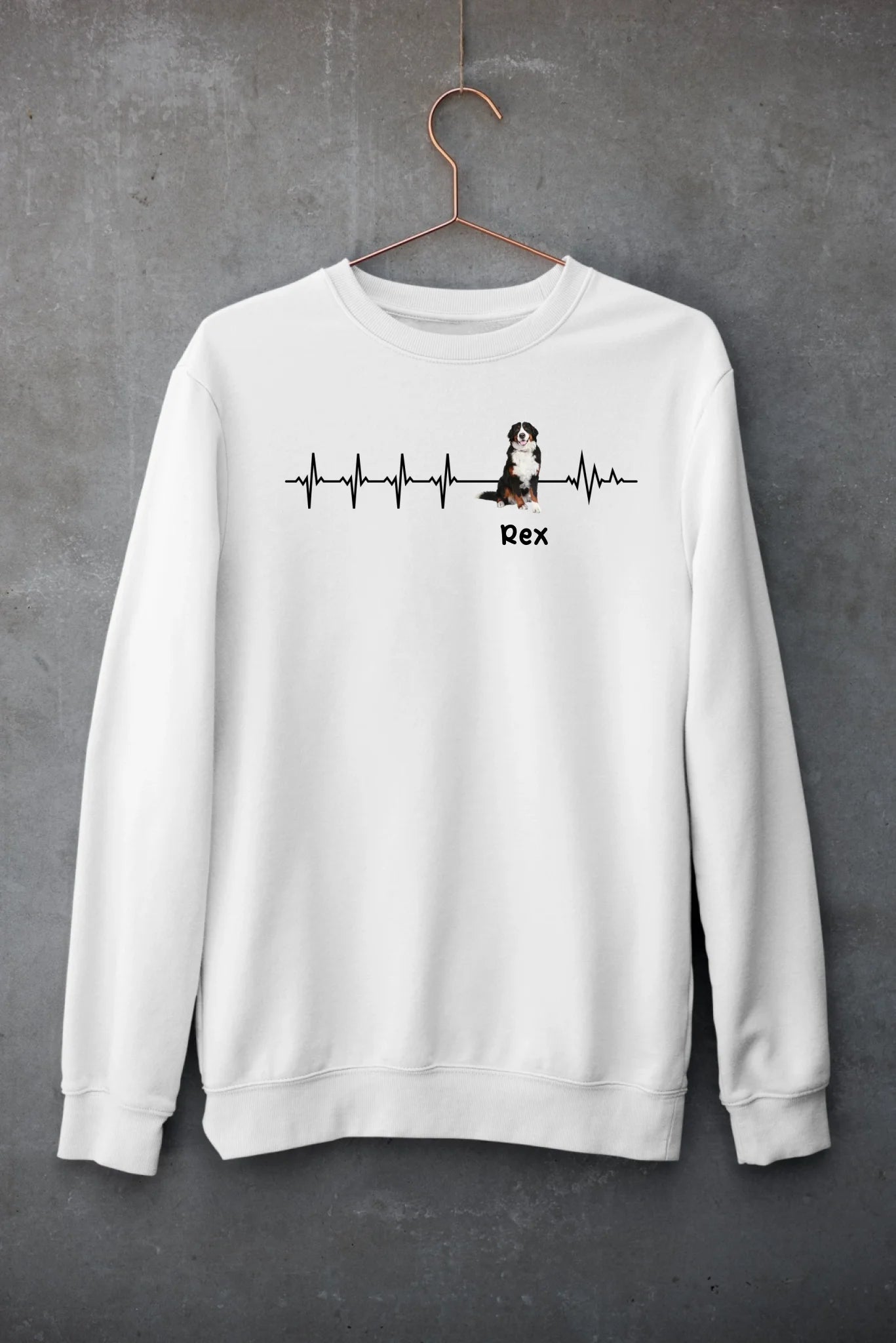 mockup-of-a-customizable-crewneck-sweatshirt-hanging-against-a-concrete-wall-33997