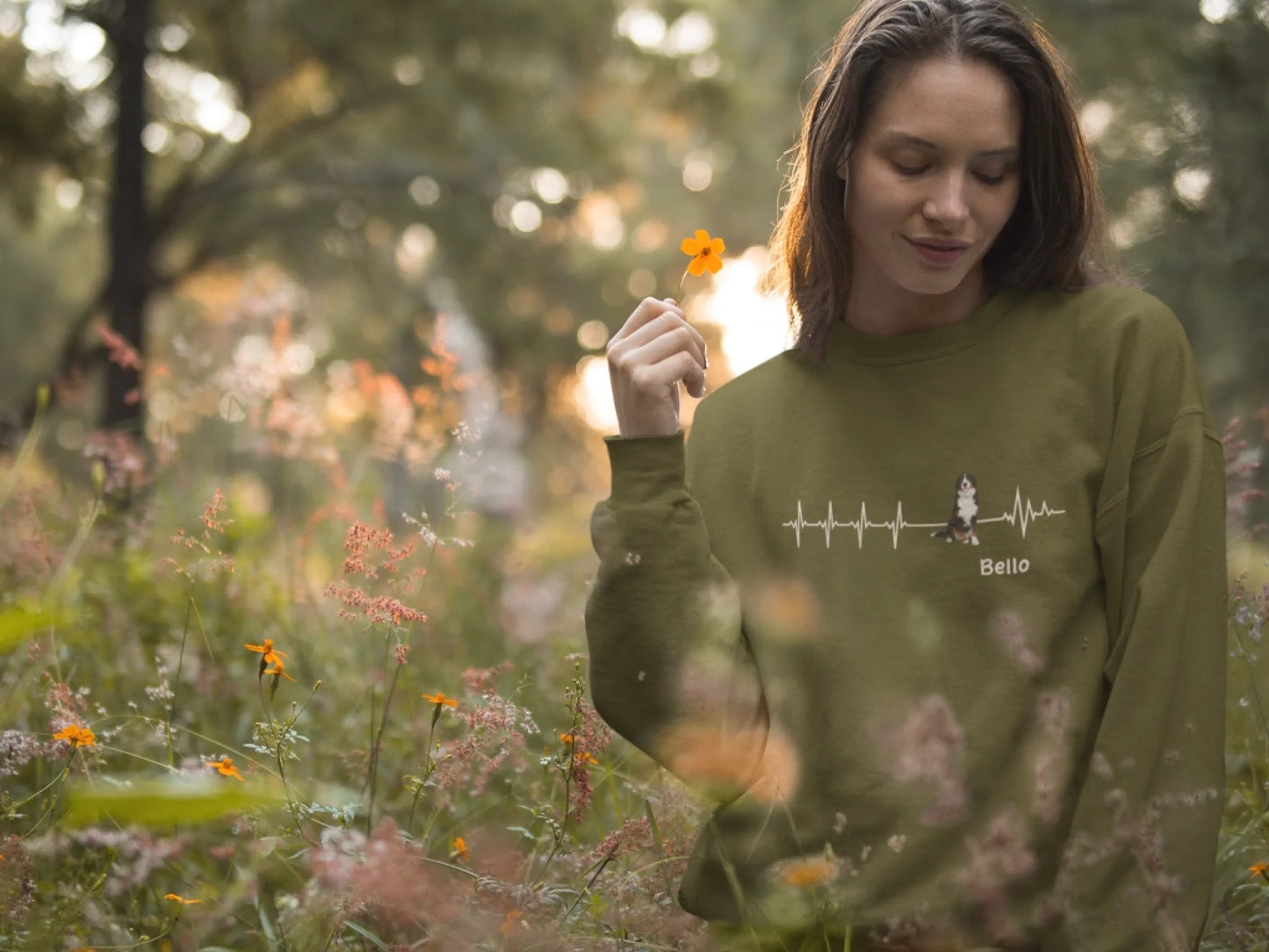 blonde-girl-wearing-a-crewneck-sweatshirt-template-while-holding-a-flower-a17913 (1)