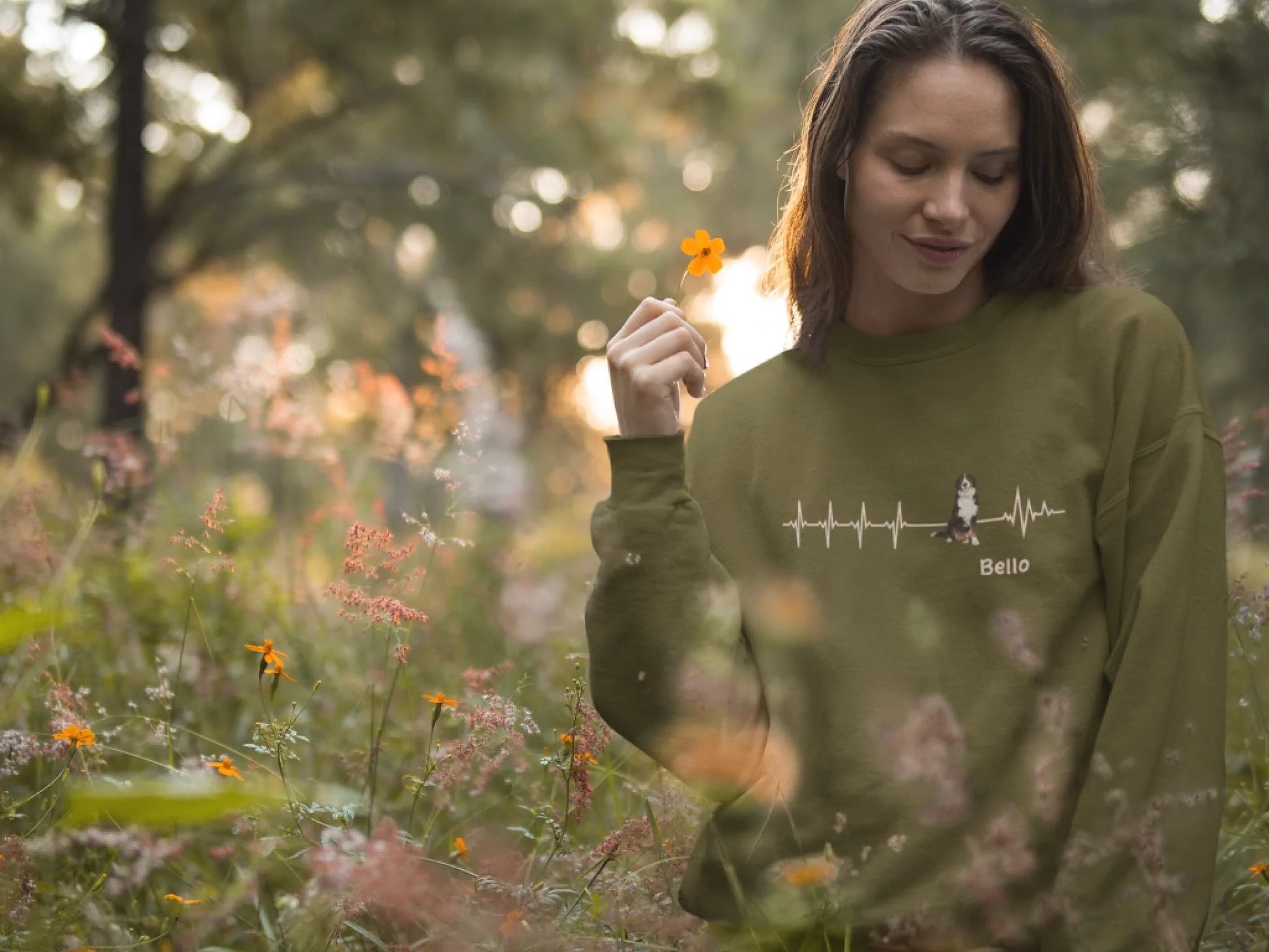 blonde-girl-wearing-a-crewneck-sweatshirt-template-while-holding-a-flower-a17913 (1)